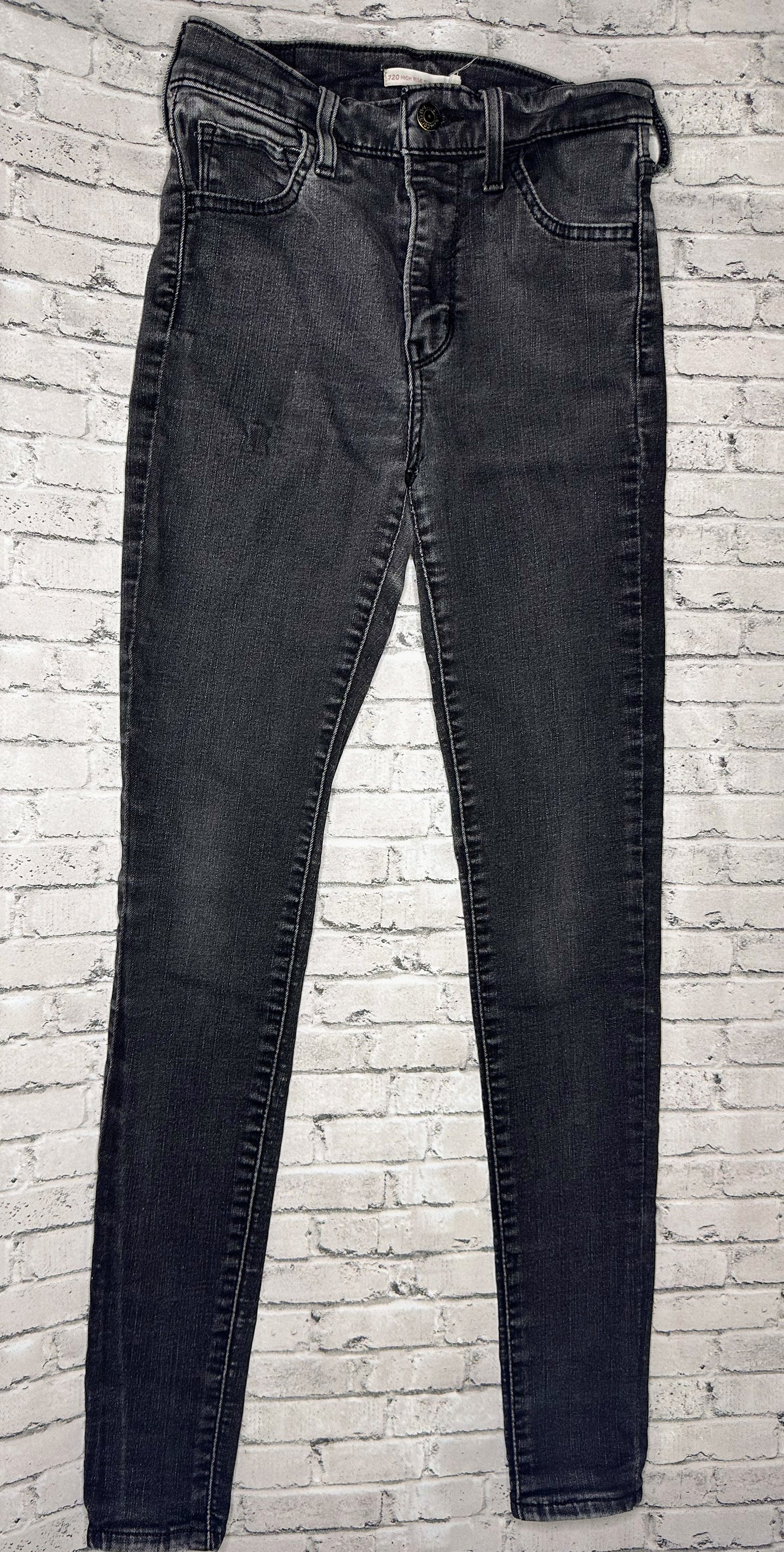 Levi Strauss: High Rise Super Skinny - 26” Waist