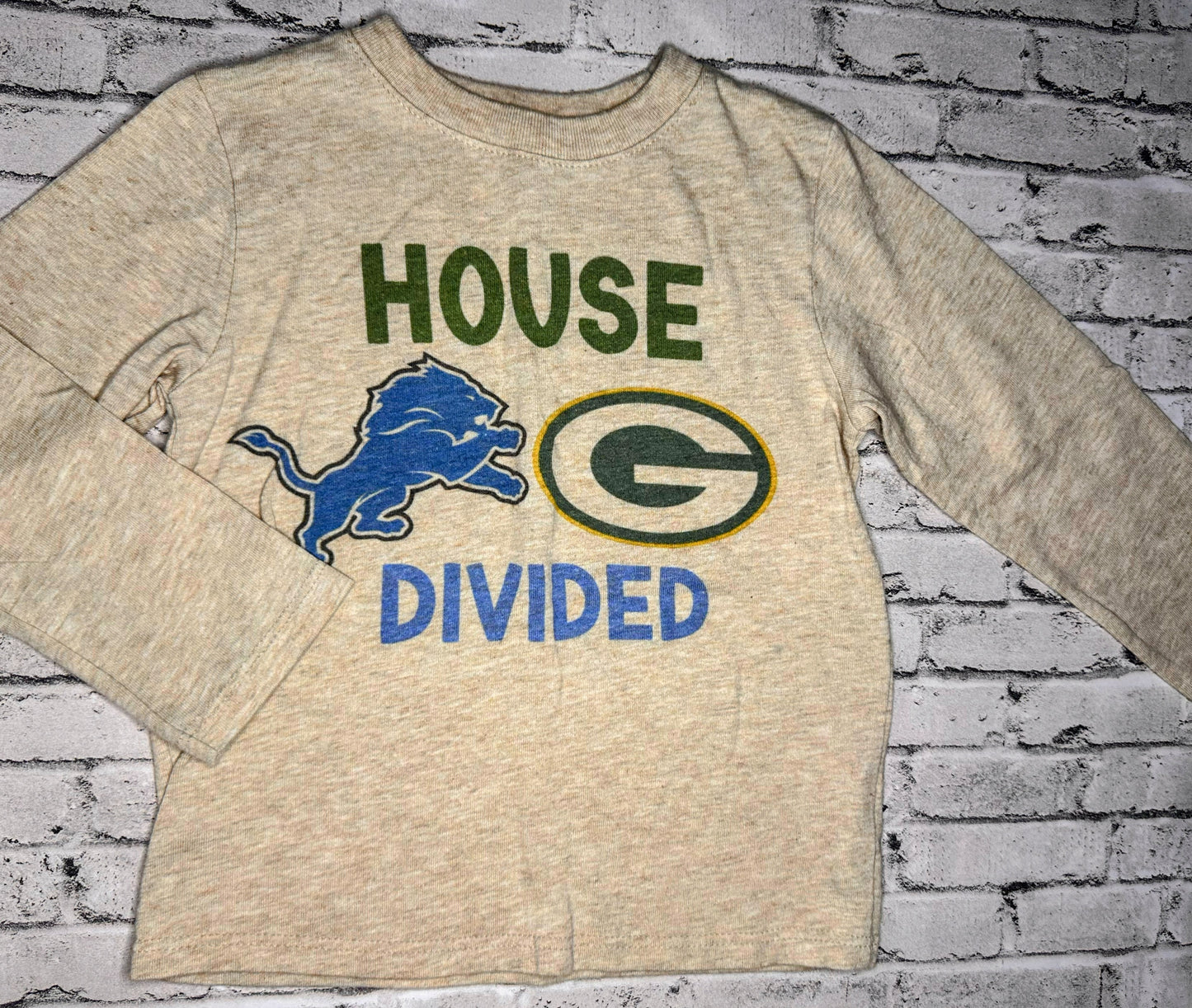 Garanimals: “Home Divided” Lions/Packer’s Tee- 2T