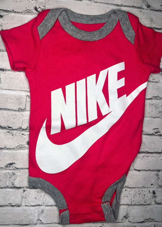 Nike: Pink Graphic Bodysuit- 0/6m